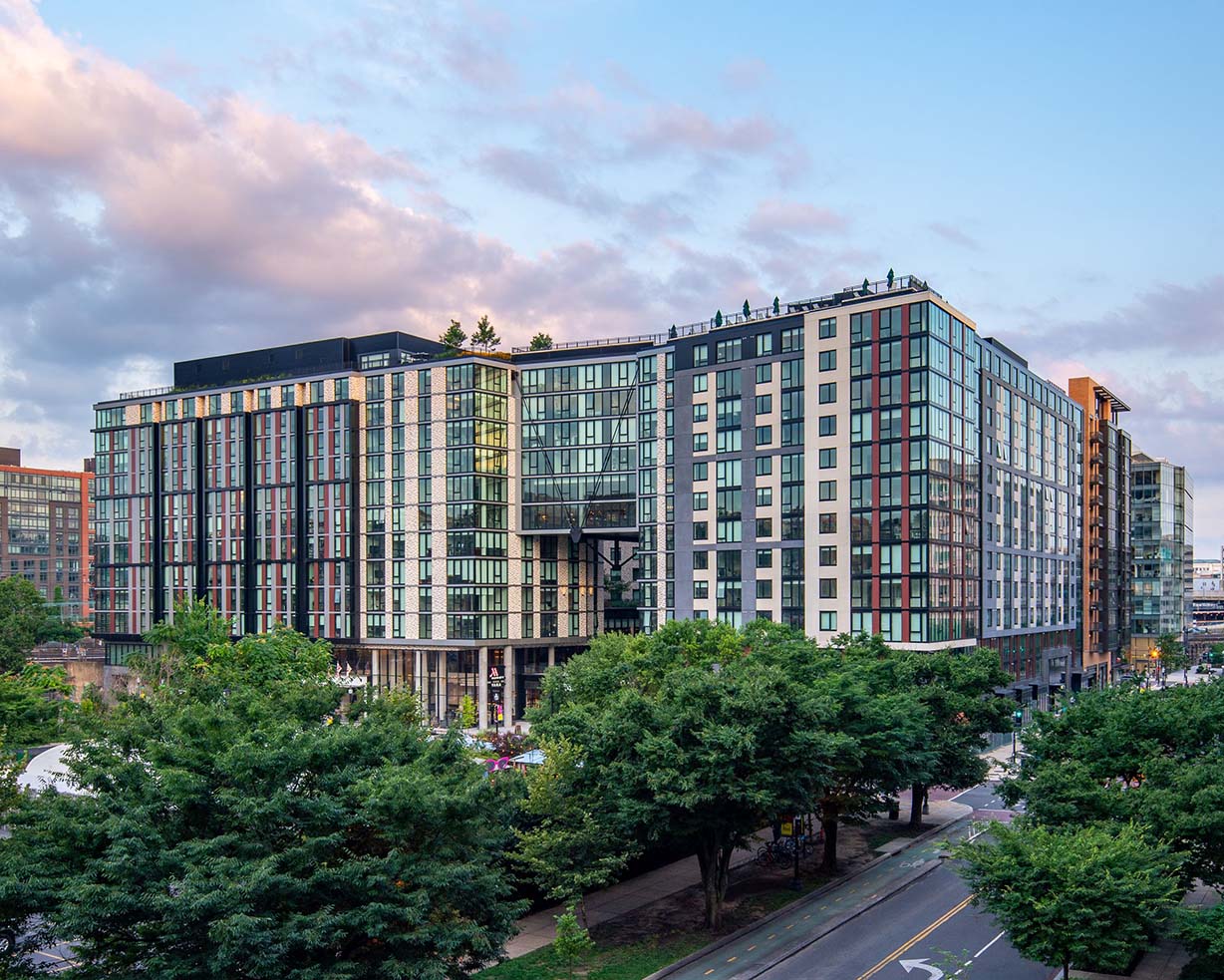 Modern multi-story building with greenery